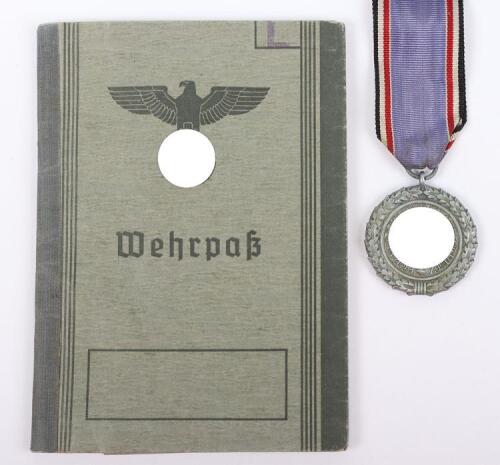 WW2 German Wherpass with Entry for the Luftschutz Decoration