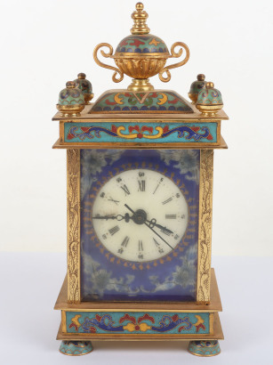 A 20th century brass and enamel mantle clock