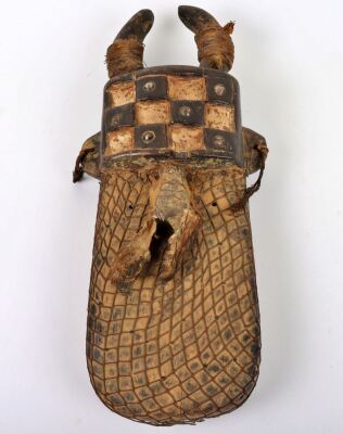 A Toma (Loma, Lorma) wooden ceremonial mask, elongated, painted white