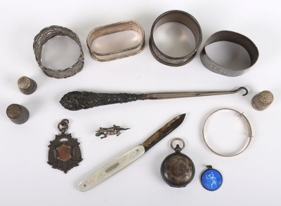 Various silver items, including four napkin rings, St Christpher enamel pendant, fruit knife - 2