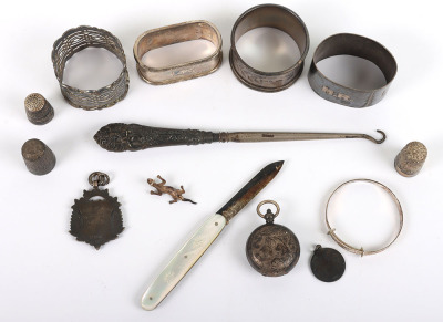 Various silver items, including four napkin rings, St Christpher enamel pendant, fruit knife - 3