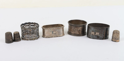 Various silver items, including four napkin rings, St Christpher enamel pendant, fruit knife - 4