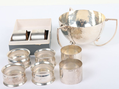 A silver hammered bowl, by Mappin & Webb, 1908, a pair of boxed napkin rings - 2