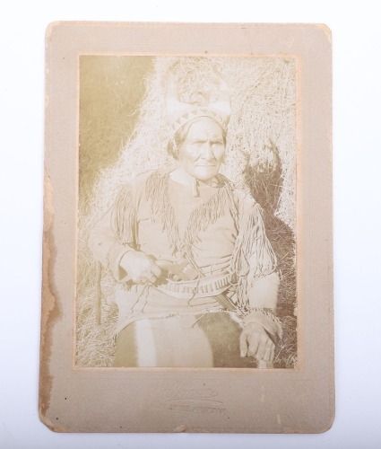 Original photograph of Geronimo by Fly holding a confederate Dance revolver