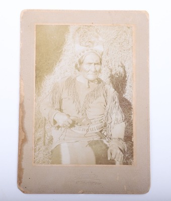 Original photograph of Geronimo by Fly holding a confederate Dance revolver