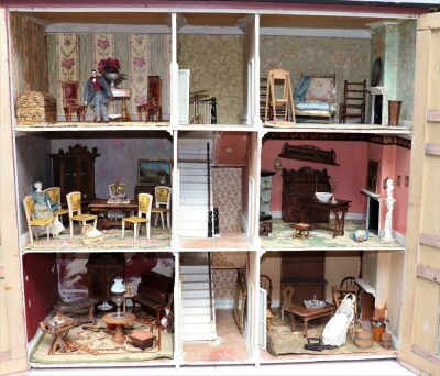 A large painted wooden dolls house and contents, English 1890s, - 2