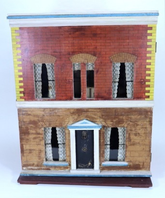 A Silber & Fleming painted wooden dolls house and contents, German circa 1890,