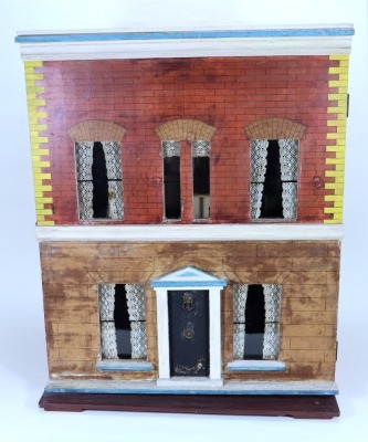 A Silber & Fleming painted wooden dolls house and contents, German circa 1890,