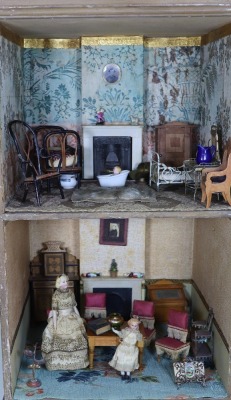 A good painted wooden dolls house and contents, English circa 1860, - 4