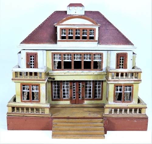 A Moritz Gottschalk model 6337 painted wooden red roof dolls house, German circa 1928,