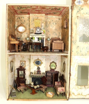 A Silber & Fleming painted wooden dolls house and contents, German circa 1890, - 2