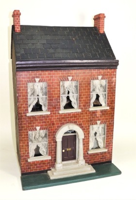 A traditional English painted red brick Victorian dolls house,