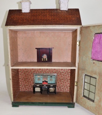 Two dolls houses including a Tri-ang wooden painted house, 1930s - 2