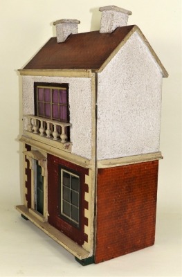 Two dolls houses including a Tri-ang wooden painted house, 1930s - 3