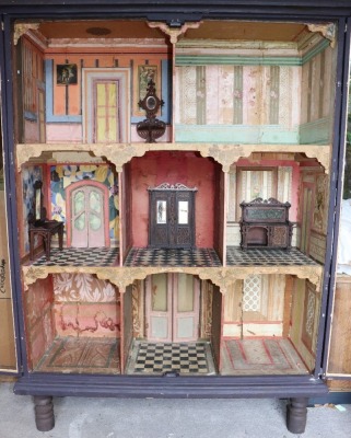 A large stained wooden dolls house display cabinet,