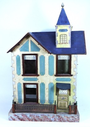 Two painted wooden dolls houses in the German style,