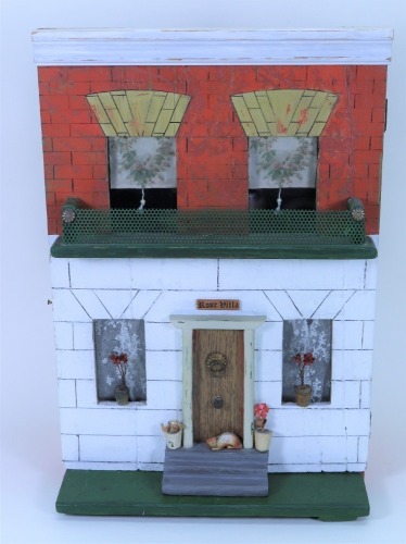 ‘Rose Villa’ a Silber & Fleming painted wooden dolls house and contents, circa 1890,