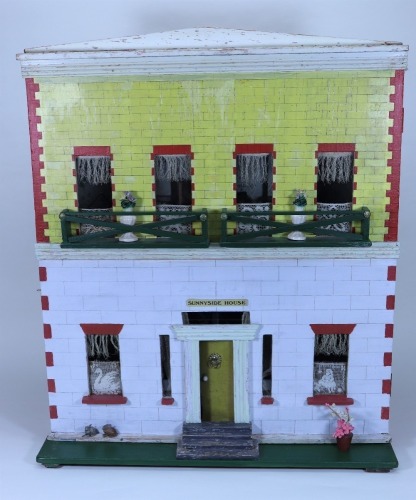 ‘Sunnyside House’ a large Silber & Fleming painted wooden dolls house and contents, circa 1890,