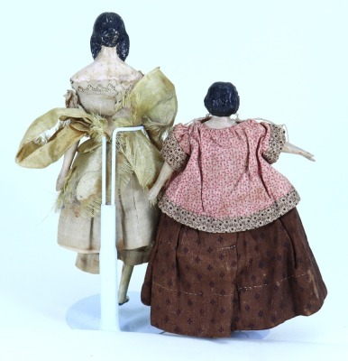 Pair of Papier-Mache shoulder head dolls, German mid 19th century, - 2