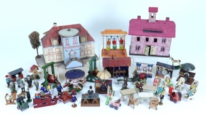 Collection of Erzgebirge figures. Fairground rides and stalls, 1900-1920s,