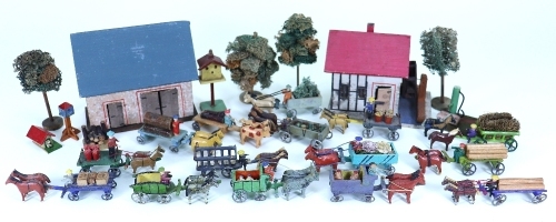 Collection of Erzgebirge buildings and horse drawn farm wagons, 1920s,