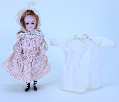 A rare Kestner all-bisque doll in original clothes, German circa 1900,