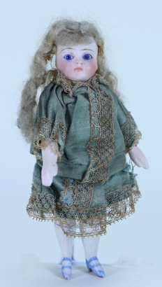 A good all-bisque Mignonette doll in original clothes, 1880s,