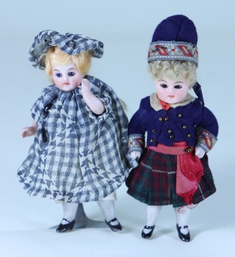 A pair of miniature all-bisque dolls, German circa 1890,