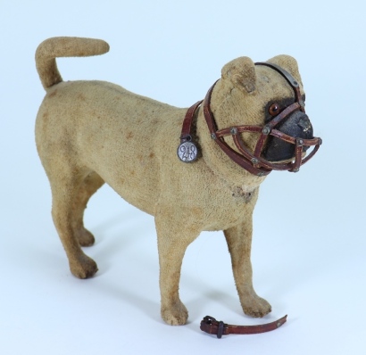 A flocked toy pug, German circa 1890,