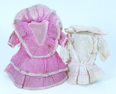 Two dresses for small size dolls,