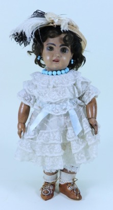 A Tete Jumeau mulatto bisque head doll, size 4, French circa 1890,