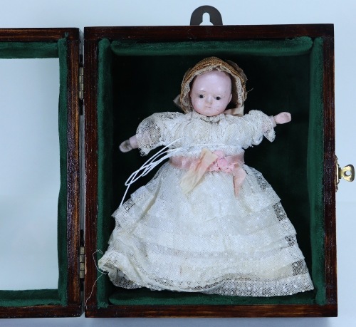 A very sweet small Sonneberg Taufling ‘Motschmann’ papier-mache baby doll, German circa 1860,