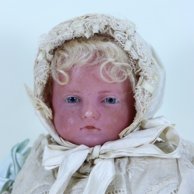 A good Pierotti poured wax shoulder head doll in original clothes, English circa 1860, - 2