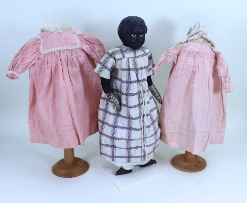 An interesting early black Gutta percher shoulder head doll, probably American,