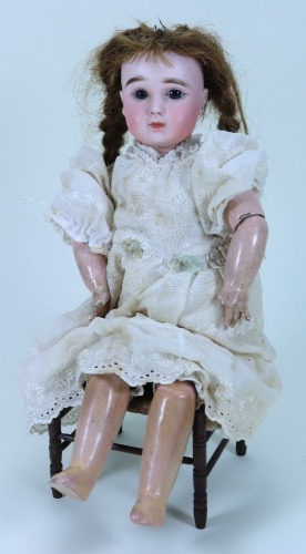 A Steiner Figure A bisque head bebe doll, French circa 1890,