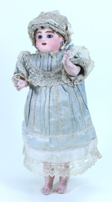 A Bebe Gigoteur ‘Kicking Steiner’ all original bisque head mechanical doll, French circa 1880,