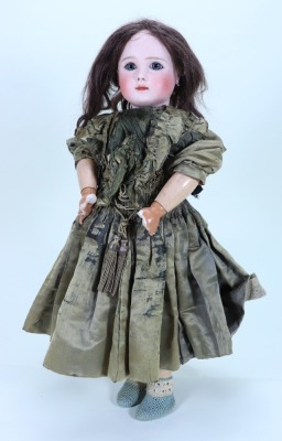 A Steiner A bisque head Bebe doll, French circa 1890,