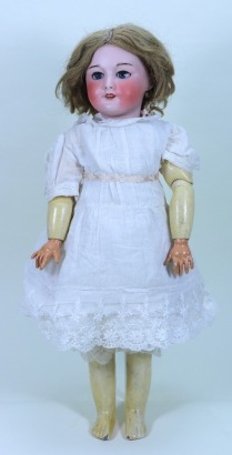 An S.F.B.J 301 bisque head mechanical ‘walker’ doll, French circa 1910,