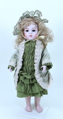 A reproduction Bru Jne size 8 bisque head Bebe doll,