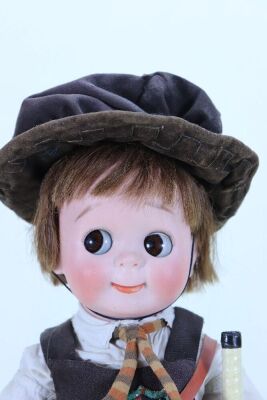 A rare large J.D Kestner 221 bisque head Googly doll in original school uniform, German circa 1911, - 3