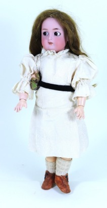 A sweet Kammer & Reinhardt /S&H bisque head ‘flirty’ doll, German circa 1910,