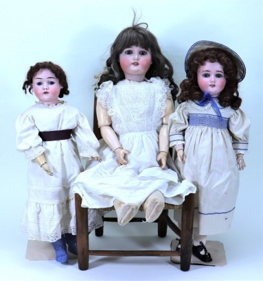 A Max Handwerck bisque head girl doll and two others, German circa 1910,