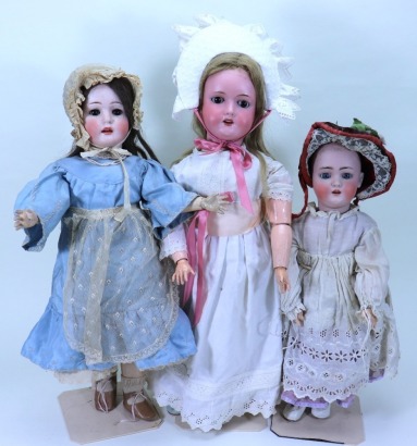 A Max Handwerck ‘Bebe Elite’ bisque head girl doll and two others, German circa 1910,