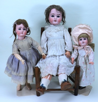 A Schoenau & Hoffmeister 1906 bisque head girl doll, German circa 1915,