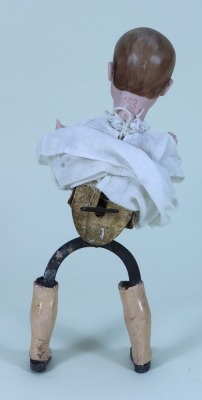 An unusual bisque head mechanical ‘walking’ doll, German circa 1910, - 2