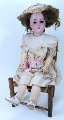 A J.D Kestner 171 bisque head girl doll in original clothes, German circa 1910,