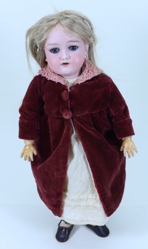 A bisque head girl doll, German circa 1910,