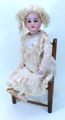 A Large Kammer & Reinhardt/Simon & Halbig bisque head girl doll, German circa 1910,