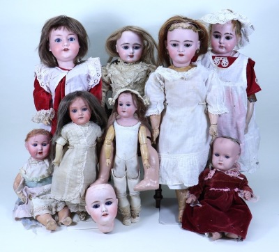 A collection of eight bisque head dolls, 1910-20s,