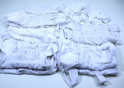 Eight Victorian white cotton Baby night gowns,